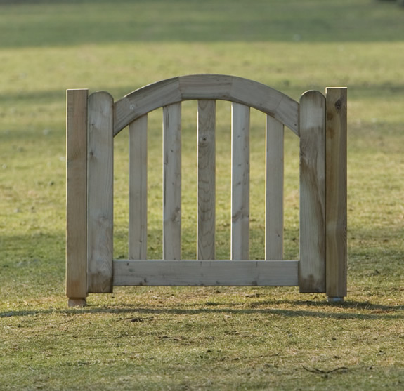 arched garden gate made from pressure impregnated timber for years of 