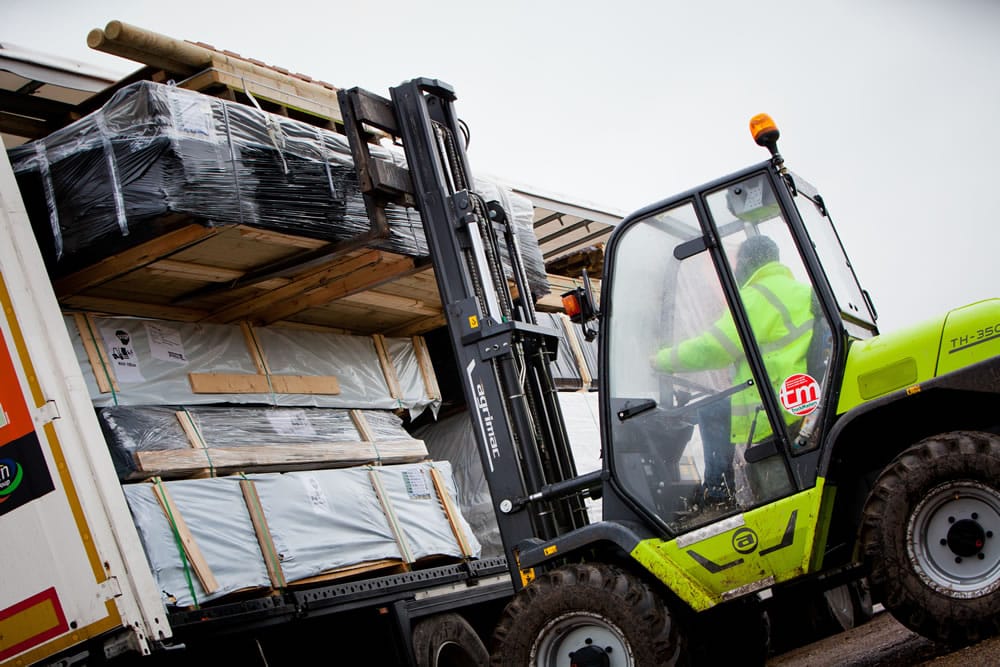 Unloading the lorries from Holland, the products are then checked and repacked for onward distribution across the UK.