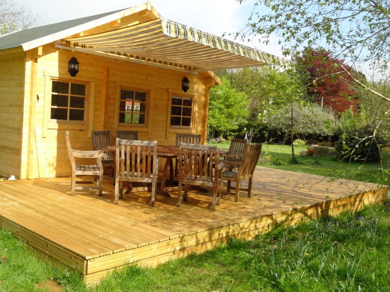 Decking area in front of the log cabin