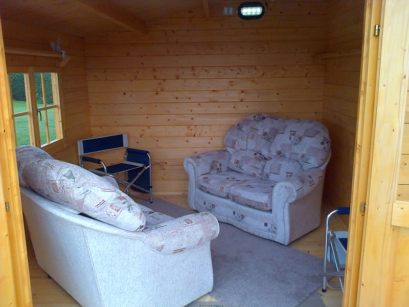 A nice sofa arrangement in one of our log cabins