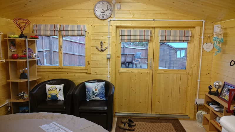 Another view of the Rome log cabin being used as a therapy room