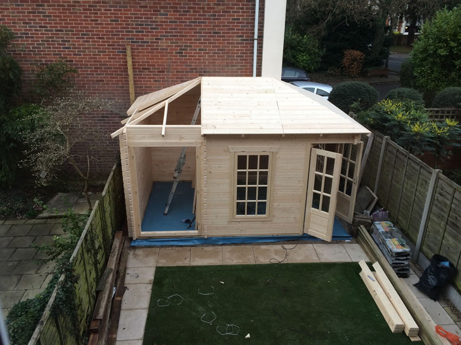 The tongue and groove 18mm roof boards are placed into position and nailed to the roof joists