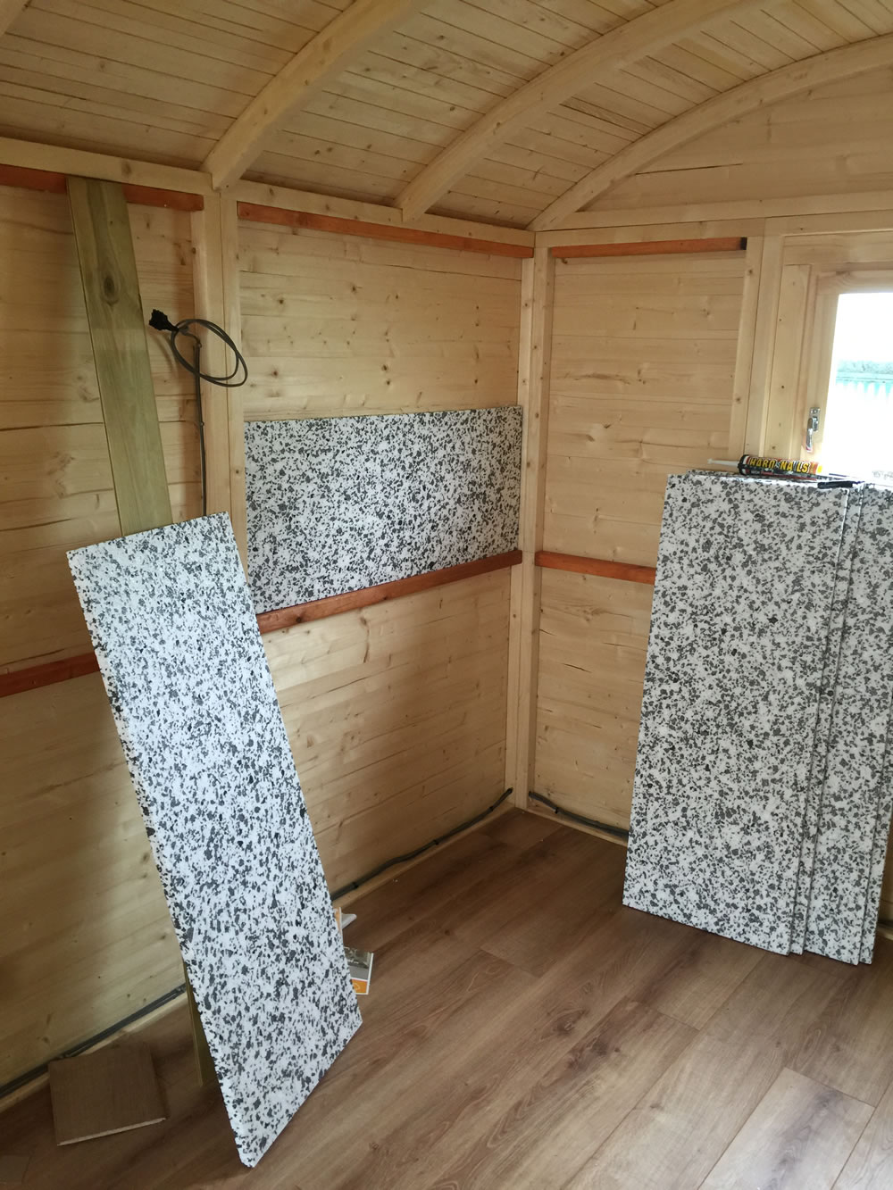 Insulation boards fitted in the wall panels.