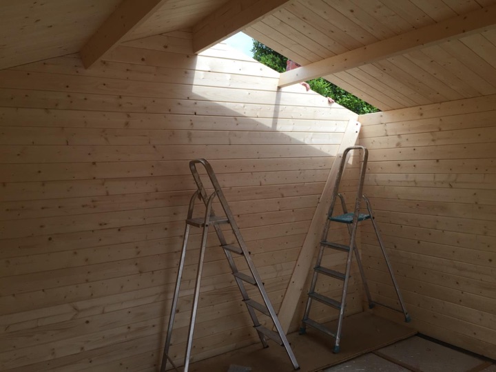 On a cabin of this size (3.8m x 3.8m) it takes about 90 minutes to board out the roof with two of you working on it.