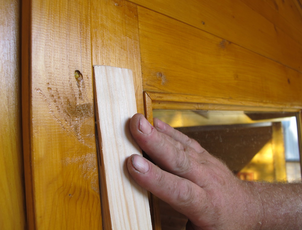 If you have a double door and have fitted a door stop trim then use a similar size piece of timber