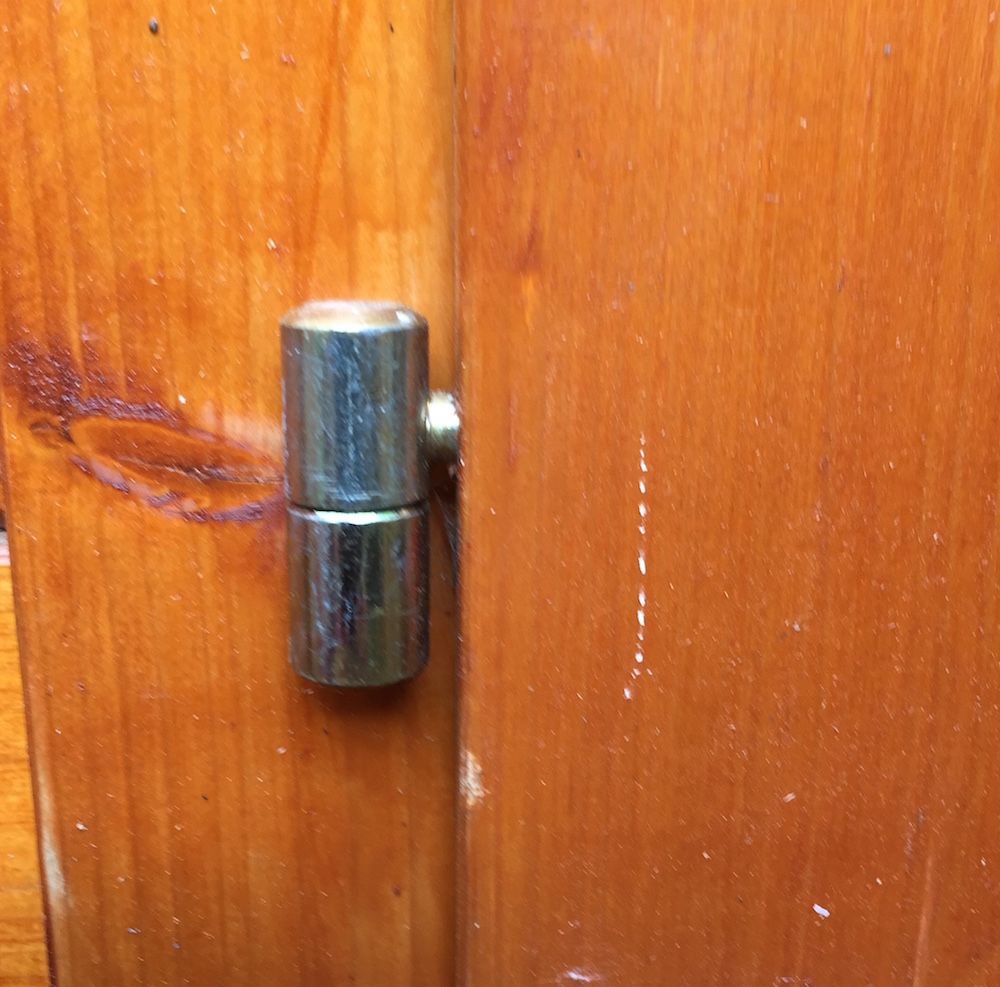 Two piece hinge forming a cup and spiggot. These can adjust the door in both planes.