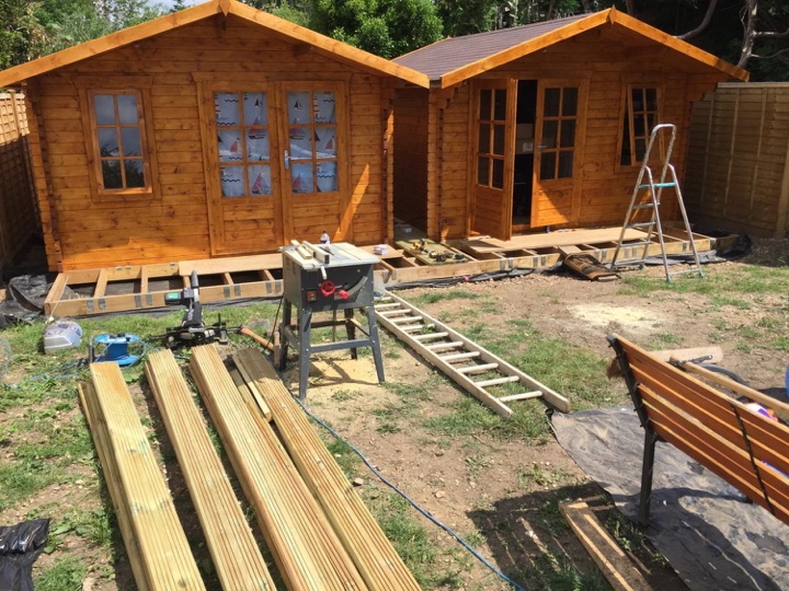 Cabins finished, time to deck the front. 144mm x 32mm Redwood planks in this case.