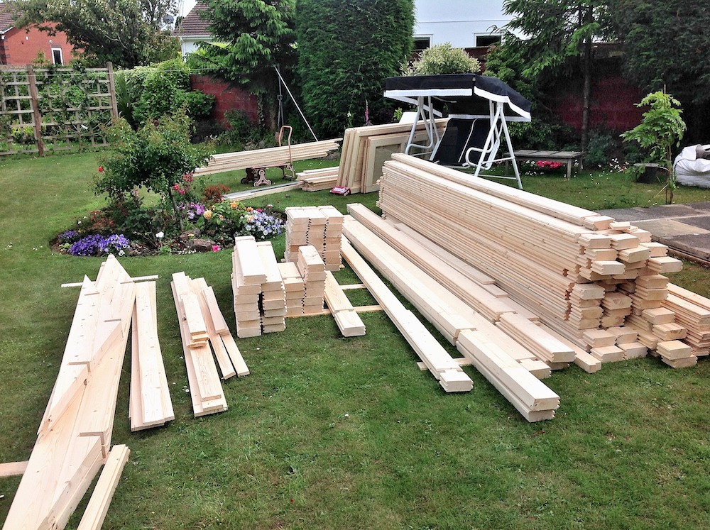 Lots of parts, all laid out correctly, it is important to keep the logs on top of each other while the build commences.