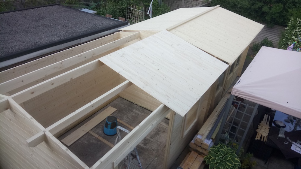 Chloe Log Cabin Roof Board Installation