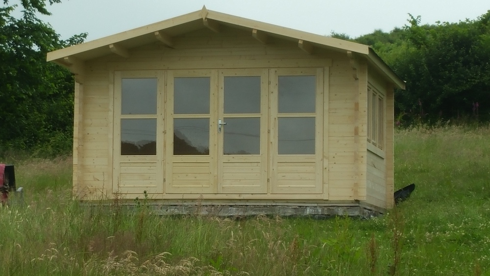 A Far View Of The Blackpool Log Cabin