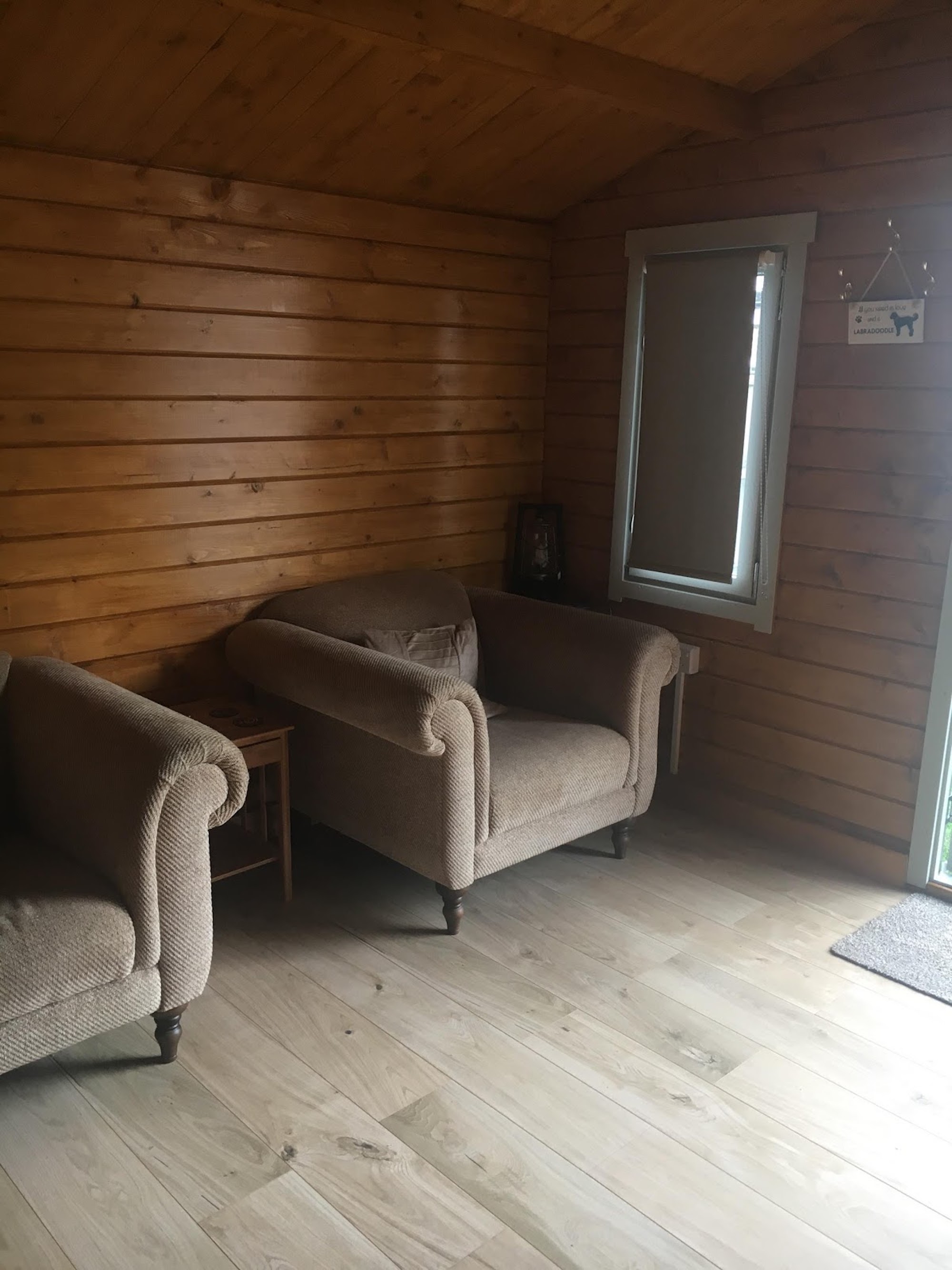 Seating inside the Ulrik Log Cabin