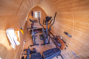 Home Garden Gym Pod Shed Log Cabin Inside, with gym equipment
