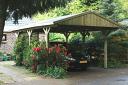 Apex Roof Carport shown with some customer modification