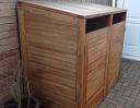 Double bin store made from hardwood.