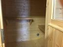 inside the oval log cabin sauna