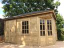 A treated Agnes corner log cabin with shed storage
