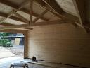 Roof trusses within the log cabin barn construction