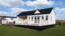 A Painted Ben clockhouse 70mm log cabin with canopy