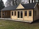 Ben 70mm clockhouse log cabin with side canopy