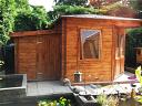 28mm log cabin shed being used with one of our corner log cabins - left handed and customer modifies the frame