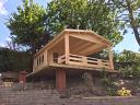 Bristol log cabin - The veranda has been modified by the fitter due to its location