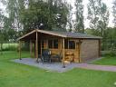 Gijs log cabin shown with an extra post added by a customer