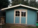 Summertime Log Cabin painted in lovely contrasting colours