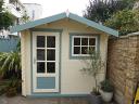 Onyx log cabin painted in solid colours