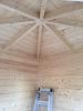 Petit corner log cabin roof structure