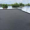 EPDM roofing material for flat roofs such as log cabins.