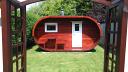 Oval log cabin sauna