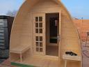 Log cabin camping pod showing a building being installed 480cm version